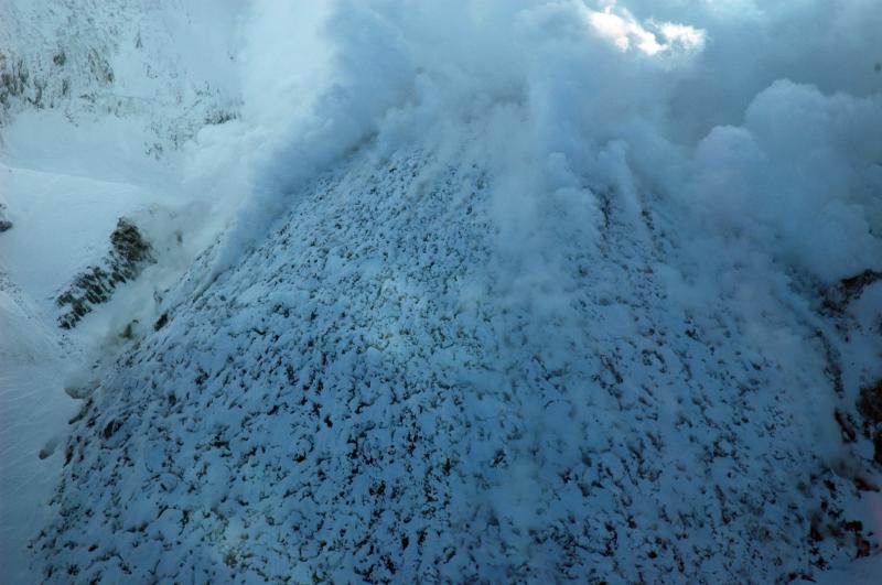 																Close view of the lava dome at Redoubt Volcano, mostly snow-covered, but with several intensely steaming fumaroles.  