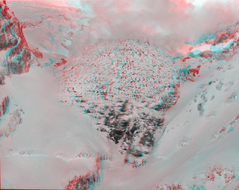 Anaglyph (3-D) image of the 2009 summit lava dome at Redoubt Volcano, Alaska. For best viewing, please use red-blue glasses, with left eye red. Anaglyph created by Peter Lipschutz, using photographs taken by Tina Neal, AVO/USGS.				