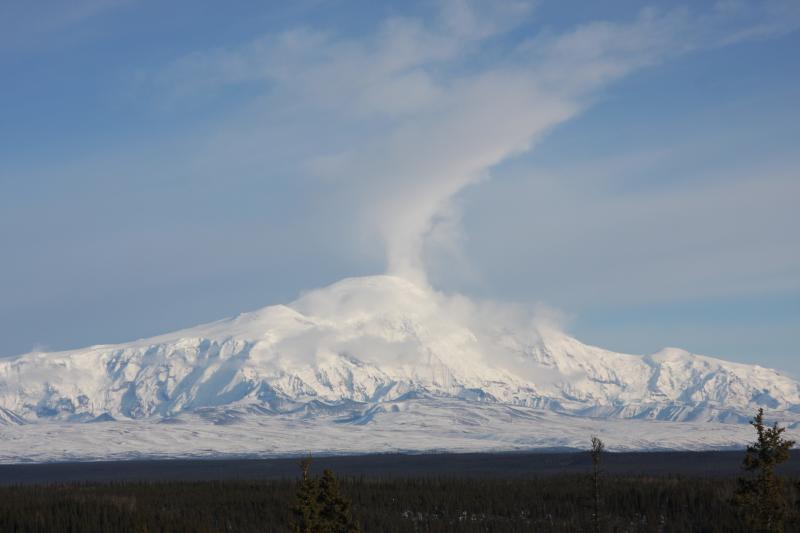 Apparent plume rising from Mt. Sanford in the Wrangell mountains east of Glennallen.  This is either meteorological, or, the result of an ice/snow fall down the 5,000-foot shear south face of Sanford.				