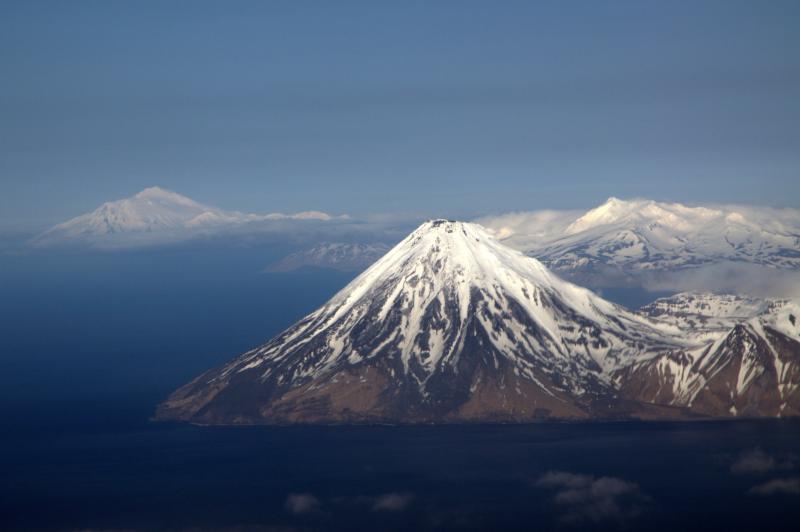 																		Kanaga Volcano Viewed from the west with Mt Moffet, Adak and Great Sitkin in the background.