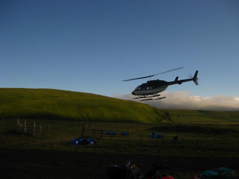 Maritime Helicopters pilot Kenny Clark taking off from the Ft. Glenn camp with a load of geologists bound for the caldera.