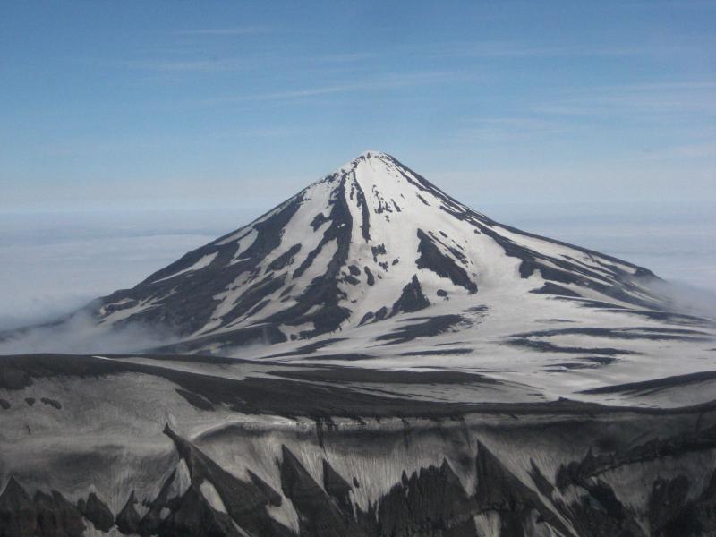 Mount Tulik, a small, older, deeply glaciated cone on the flank of Okmok.