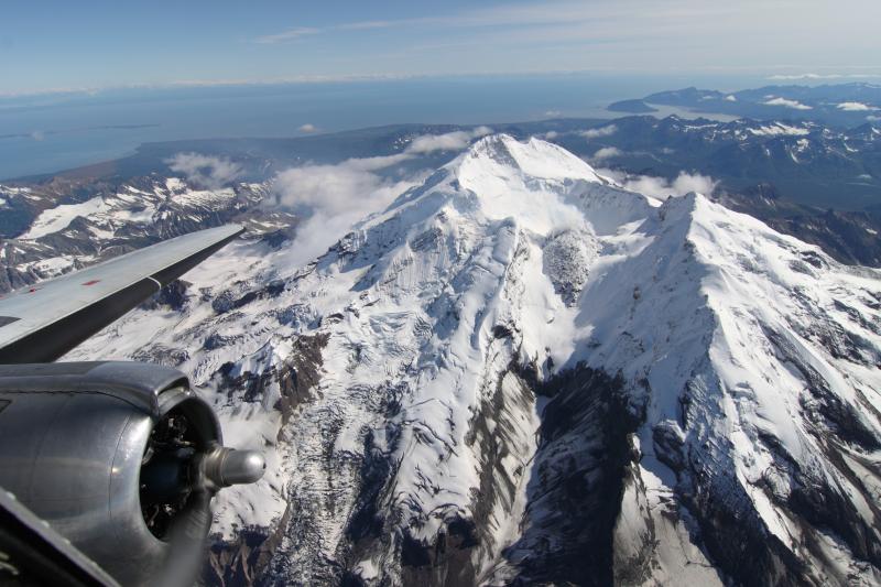 Aerial photograph of Redoubt Volcano, showing snow on the 2009 lava dome, taken August 5, 2011, by Charles Earnshaw. Photograph courtesy of Charles Earnshaw.