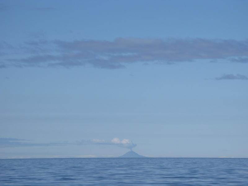 Augustine Volcano, with an impressive, but still normal steam plume, as viewed from a boat in Cook Inlet on August 15, 2011. Photograph courtesy of Ed Marker.