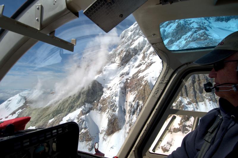 Pathfinder Aviation Pilot Bill Springer pilots the helicopter infront of the south fumarole on Iliamna.