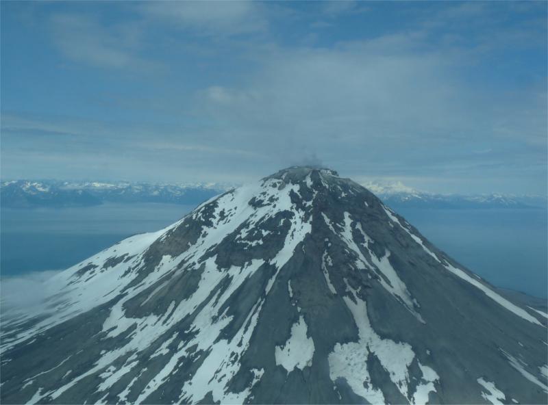 Augustine Volcano viewed from the South. A small gas plume can be identified drifting towards the observer.