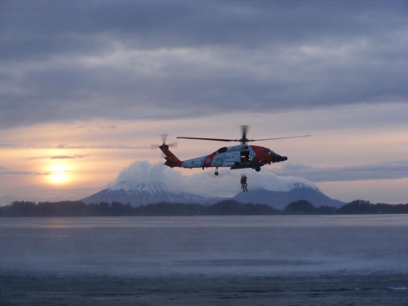 USCG rescue practice near Sitka. Scenic Edgecumbe volcano is in the background. Photograph courtesy of Sara Francis, USCG.