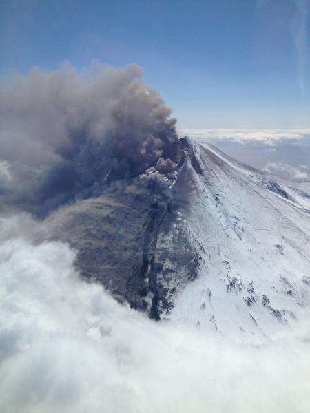 Pavlof in eruption, with ash, steam, and gas plume. Photograph courtesy of Brandon Wilson. May 17, 2013.