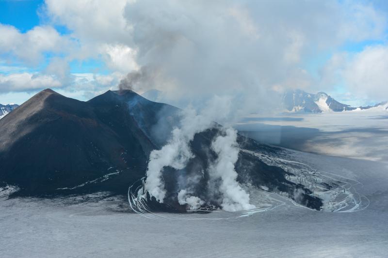 Southwest flank of the intracaldera cone at Veniaminof Volcano showing lava flows emplaced during June-July eruptive activity. View is toward the east. These flows appear similar to the lava flows produced during the 1993 eruption.