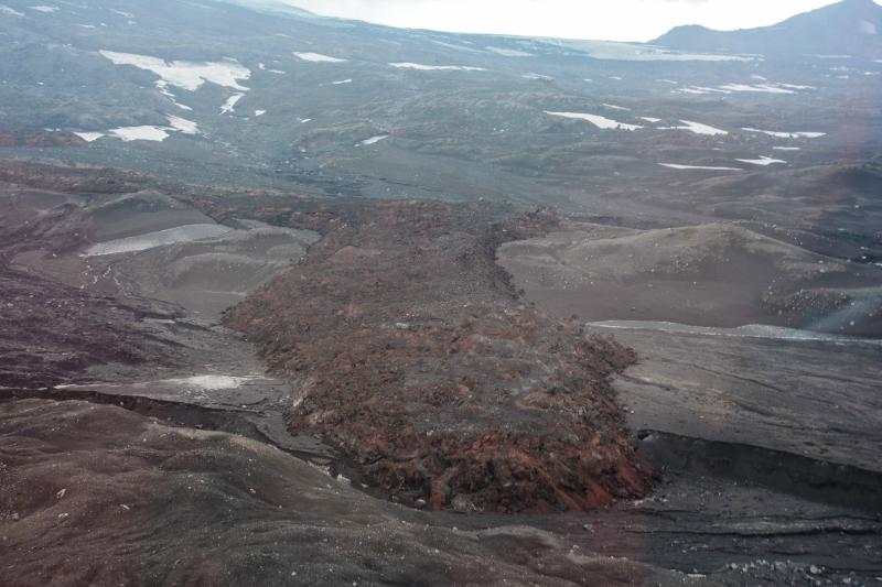 Lava flow on the northwest flank of Pavlof Volcano emplaced during the May 2013 eruption. The thickness of the lava flow is about 20 meters. View is to the southwest.