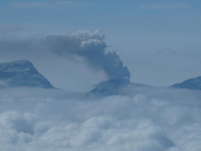 Veniaminof&#039;s active cone, with low-level ash and steam plume. Photo taken July 27, 2013, courtesy of Paul Horn.