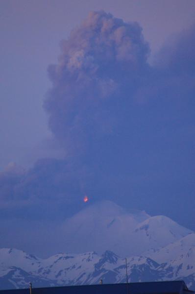 Pavlof volcano, with lava fountaining and ash plume, evening of June 2, 2014. View from Cold Bay, AK. Photo courtesy of Robert Sigurdson.
