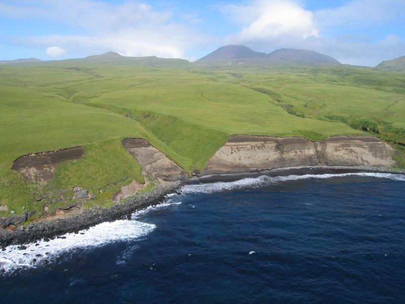Photograph of caldera-forming deposits exposed in the southern coastline of Semisopochnoi Island.