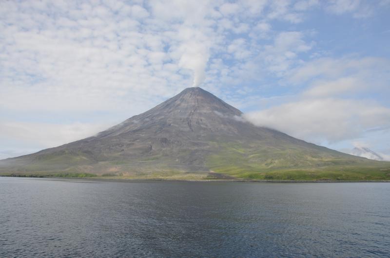 Cleveland Volcano from South Cove, Chuginadak Island. Photo taken from the deck of the R/V Maritime Maid during the 2014 field season of the Islands of Four Mountains multidisciplinary project, work funded by the National Science Foundation, the USGS/AVO, and the Keck Geology Consortium.