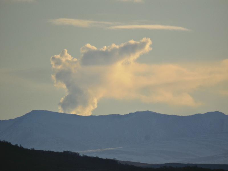 View from King Salmon, November 24, 2014, looking southeast, of a vigorous fumarolic plumes from Mount Martin. Martin has a long-lived, active fumarole field that often produces impressive steam plumes under optimal atmospheric conditions. Photo courtesy of Robert Gary Hadfield.
