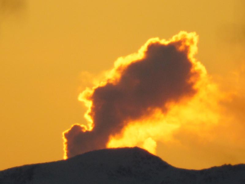 View from King Salmon, November 24, 2014, looking southeast, of a vigorous fumarolic plumes from Mount Martin. Martin has a long-lived, active fumarole field that often produces impressive steam plumes under optimal atmospheric conditions. Photo courtesy of Robert Gary Hadfield.