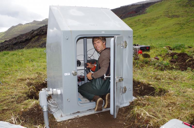 AVO&#039;s Max Kauffman working to install seismic station CLES on the southeast flank of Cleveland volcano. Photographs from the 2014 Islands of Four Mountains project. 