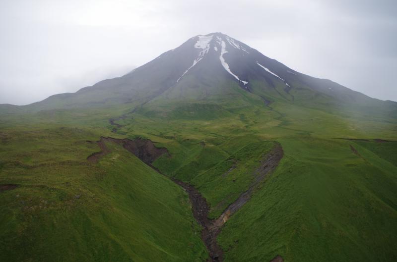 Northeast flank of Carlisle Volcano. Note small patch of glacial ice preserved near the summit. Photographs from the 2014 Islands of Four Mountains project. 