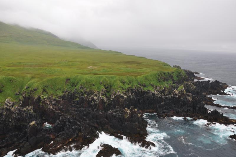 West coastal lava delta, Carlisle Island. Counter clockwise orbit of Carlisle volcano just offshore in strong wind. Photo taken during the 2014 field season of the Islands of Four Mountains multidisciplinary project, work funded by the National Science Foundation, the USGS/AVO, and the Keck Geology Consortium.