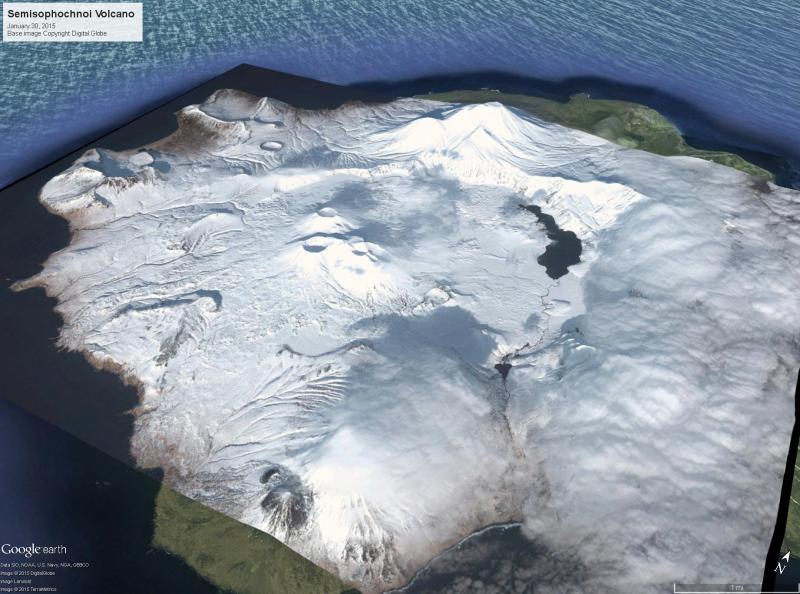 Worldview satellite image overlain over topography showing Semisopochnoi on January 30, 2015. The three prominent craters in the center belong to Mount Cerberus (named for the three-headed dog in Greek and Roman mythology); the peak behind and to the right of Cerberus is Anvil Peak. Sugarloaf Peak is in the foreground, just left of center. View is from the southeast. 