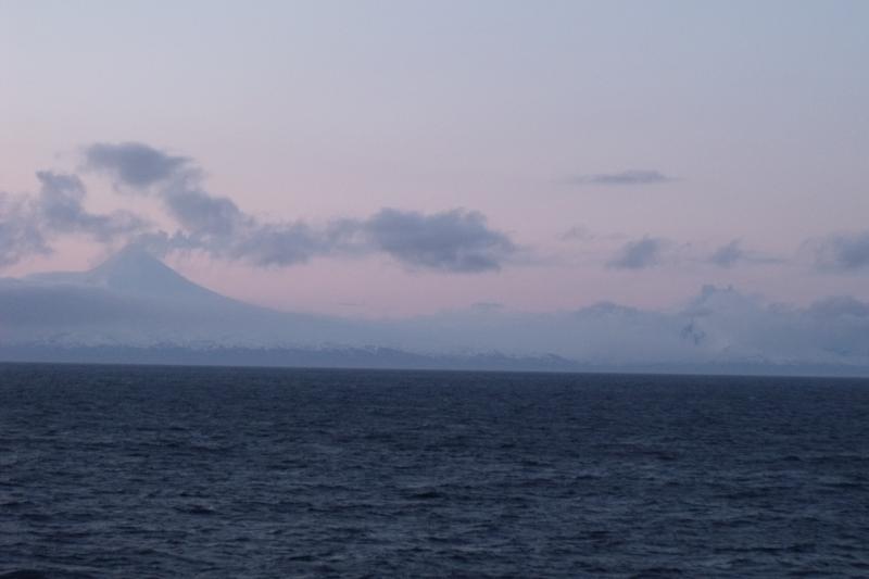 Shishaldin with steam and minor ash plume, May 7, 2015, looking north, as viewed from a ship south of Shishaldin. Photo courtesy of Allan and Kathy Lowe. 