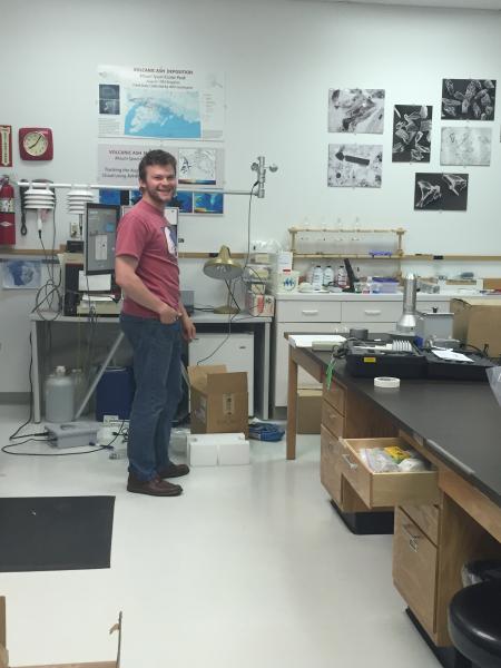 Mark Hansen, AVO particulate monitor guru, calibrating the instruments in the Alaska Tephra Lab before deployment on Kodiak Island.