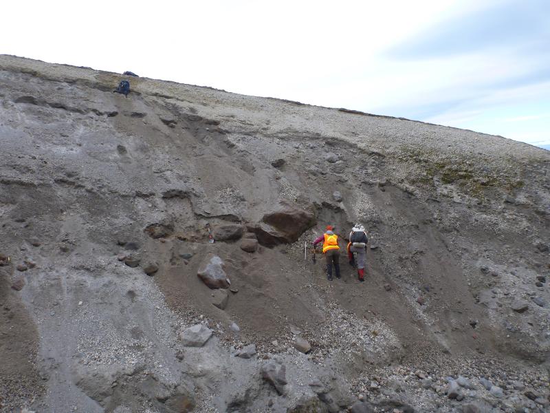Kristi Wallace and Jim Vallance look at fall and flow deposits associated with an eruption of Augustine that took place about 1,000 years ago (&quot;C&quot; tephra). Photographs from geology field work at Augustine, August 2015.
