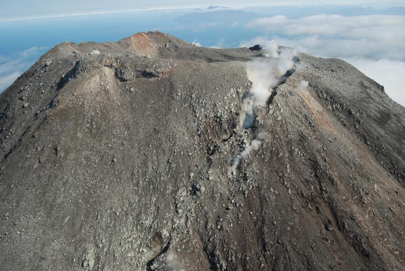 Kanaga&#039;s summit viewed from the southwest with the 2012 fracture and abundant fumarolic degassing visible.