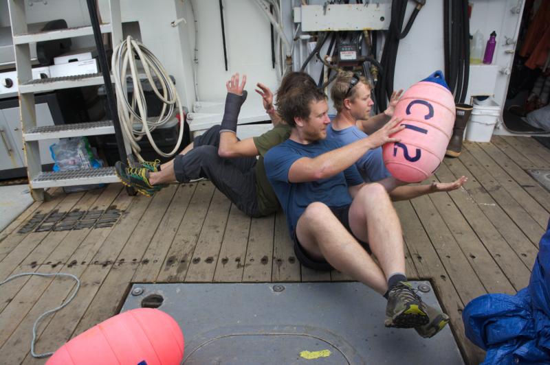 Seismic team (Dane Ketner, Adrian Bender and John Lyons) maintaining peak physical fitness with boat-bound calisthenics.  
