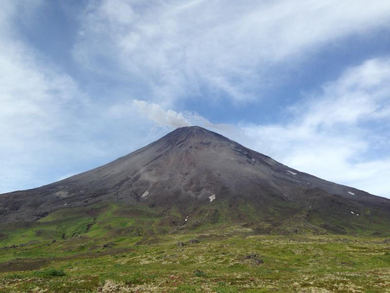 A clear view of Cleveland volcano with a summit plume