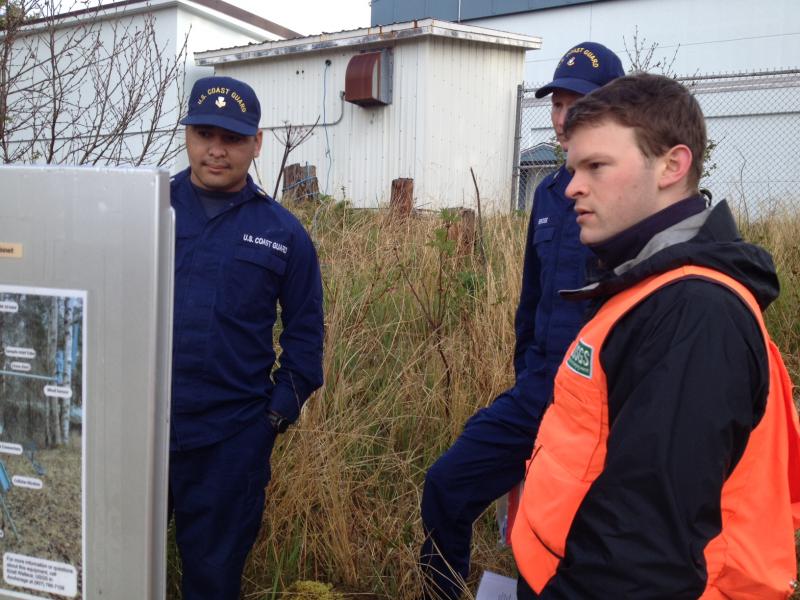 AVO staff Mark Hansen training USCG staff to operate AVO&#039;s particulate monitor deployed to Kodiak to measure ash in the air during days when ash is resuspended from the Katmai region on the Alaska Peninsula to Kodiak Island.