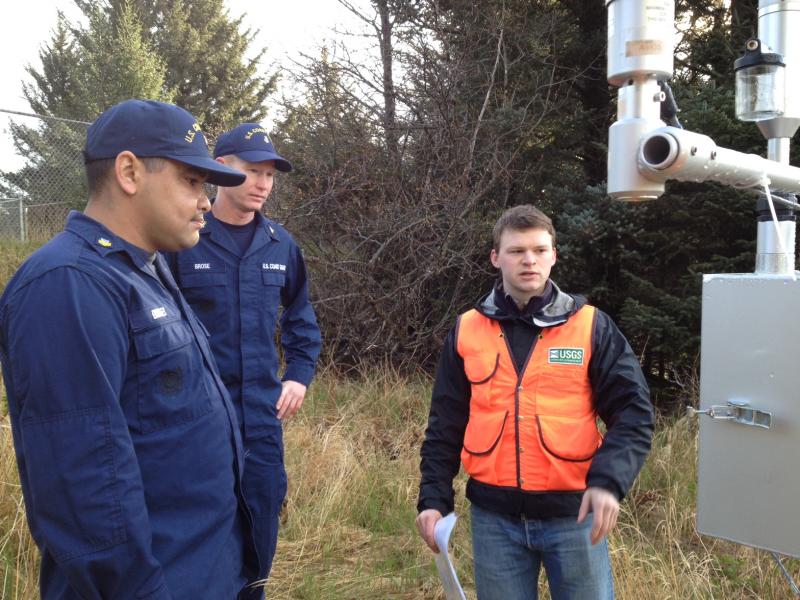 AVO staff Mark Hansen training USCG staff to operate AVO&#039;s particulate monitor deployed to Kodiak to measure ash in the air during days when ash is resuspended from the Katmai region on the Alaska Peninsula to Kodiak Island.