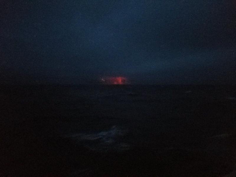 Photograph of Bogoslof&#039;s December 23, 2016 eruption, showing  ash emission, lightning, and the ejection of incandescent lava and fragmental material. Photo taken on the morning of December 23, 2016, by the crew of the US Coast Guard Cutter Alex Haley. Photo used with permission from the USCG.