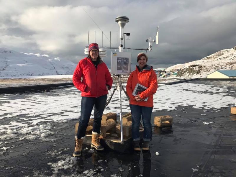 AVO geologists Janet Schaefer and Kristi Wallace visit Unalaska and Dutch Harbor to meet with the community and talk about ashfall from the recent Bogoslof eruption. They also installed an air quality monitoring instrument (pictured here). 