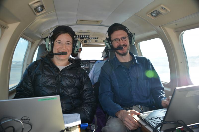 USGS Volcano Emissions Project scientists Laura Clor and Peter Kelly prepare to collect airborne volcanic gas measurement during the 2017 Cook Inlet Gas Flight. Photo by Taryn Lopez, UAFGI/AVO.