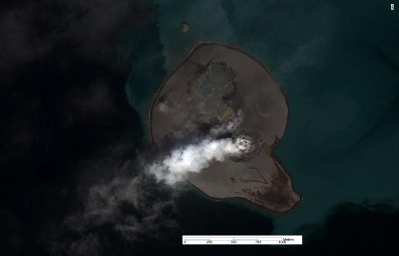 Worldview true color satellite image of Bogoslof volcano collected on August 8, 2017, a day after a 3-hour-long explosive eruption. Ash fall deposits have greatly expanded the island towards the north as the result of the eruption and forming a crater lake. Note that at the time of this satellite overpass, the level of the crater lake is below sea level. Previous events such as these (that formed a shallow crater lake) formed a deep crater that was subsequently filled by the influx of ocean water. Vigorous steaming is observed from the likely site of the initial explosive event in mid-December 2016. Sediment coming from erosion of the island is seen in the ocean. 
Data provided under the Digital Globe NextView License