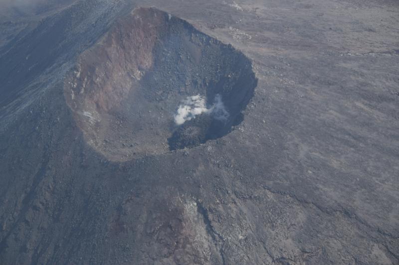 A small lava dome grows in the summit crater of Cleveland volcano.