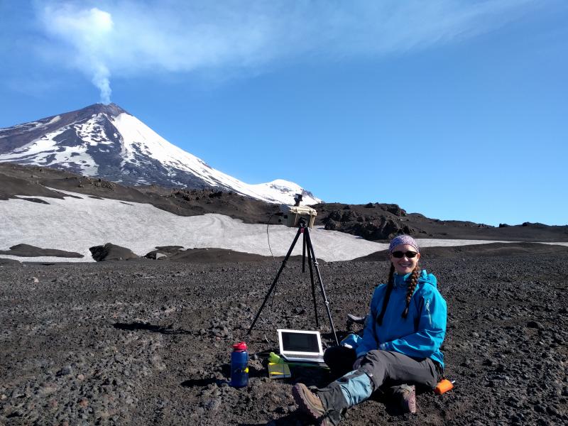 AVO geoscientist Taryn Lopez (UAFGI/AVO) collects gas measurements at Pavlof Volcano during 2017 fieldwork. Photo by Pavel Izbekov, UAFGI/AVO.