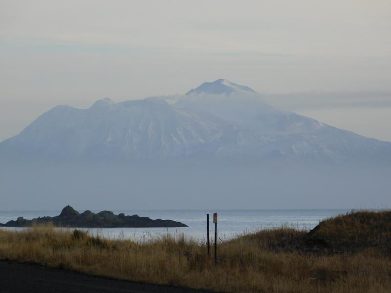Steaming from Great Sitkin Volcano as visible from the town of Adak (40 km or 25 miles to the SW).