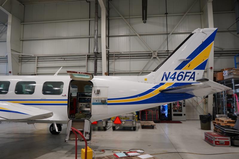 Gas equipment installation on Security Aviation Navajo Airplane for AVO&#039;s annual Cook Inlet Gas flight. Sensors for in-plume measurements can be seen through plane&#039;s doorway. Upward looking telescopes (behind door) are used for remote sensing instruments.