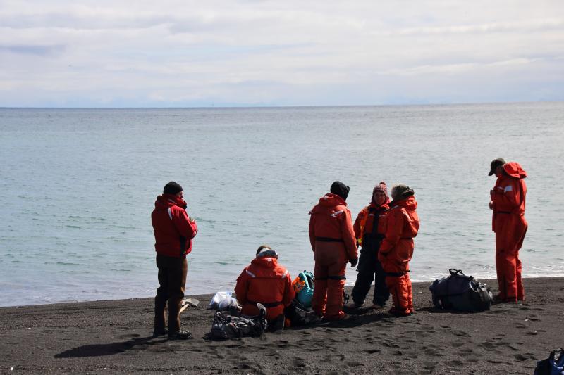 Day 2 of Bogoslof field work. Scientists waiting to be picked up from Bogoslof Island.