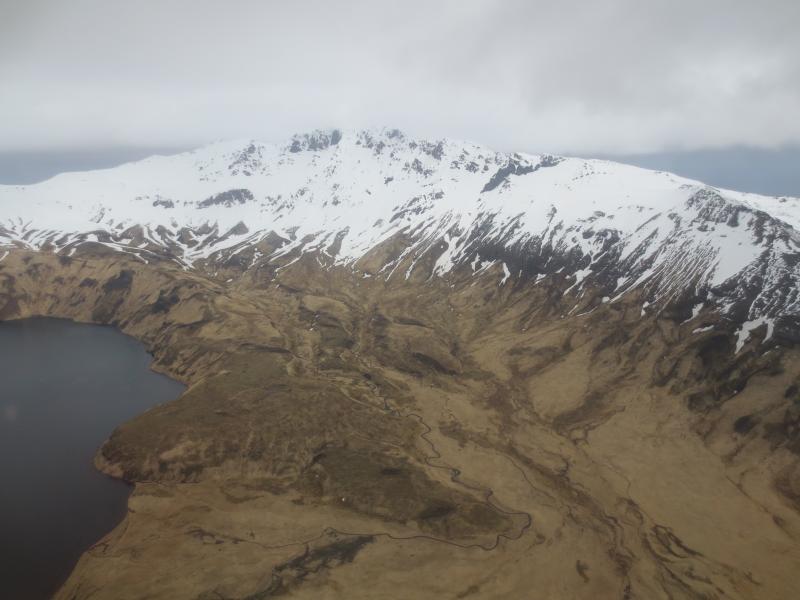 Perret Ridge from the south with Fenner Lake at left.  Photos of Semisopochnoi Island taken in May 2017 during AVO station maintenance activities and supported by U.S. Coast Guard.  