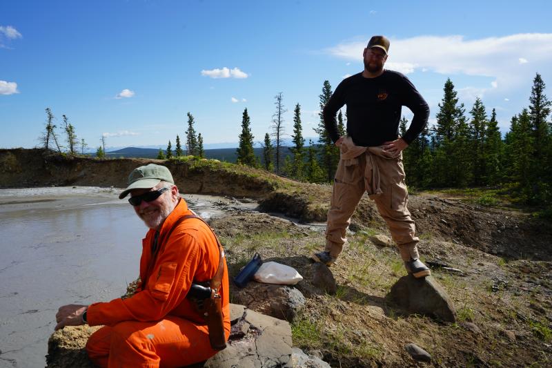 Game McGimsey &amp; Mike Gover observe gas sample collection at Shrub&#039;s summit pond.