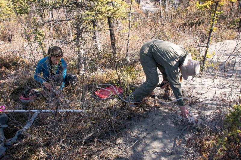 Taryn Lopez (left) and Valerie Wasser (right) collecting gas samples from new vents at northern base of Shrub mud volcano.