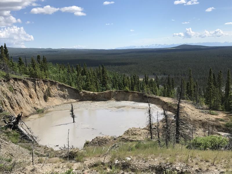 View of Shrub summit lake, looking roughly south. Upper Klawasi mud volcano in the middle distance.