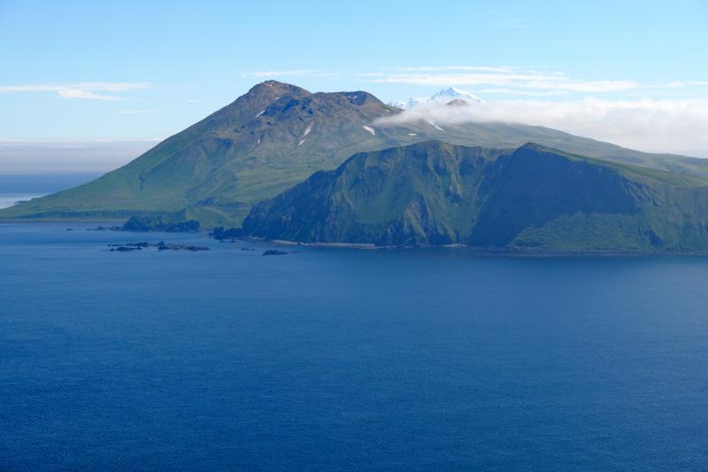 Adagdak (left), Great Sitkin (right horizon), and Andrews Bay (front) volcanos from above Andrews Bay.