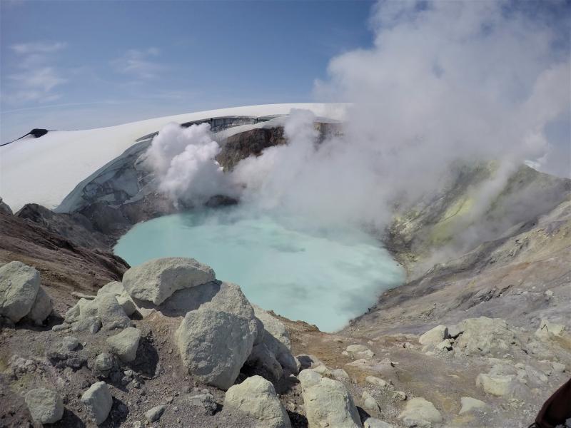 Fumaroles, crater lake, and sulfur deposits at the summit of Makushin volcano.
Makushin summit hike by Jacob Whitaker, August 8, 2019.