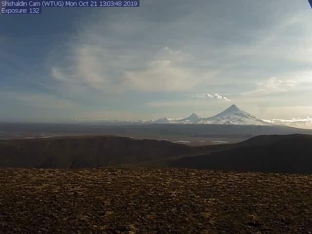 Steam emissions from strombolian eruptive activity in the summit crater of Shishaldin Volcano as seen from the NW.