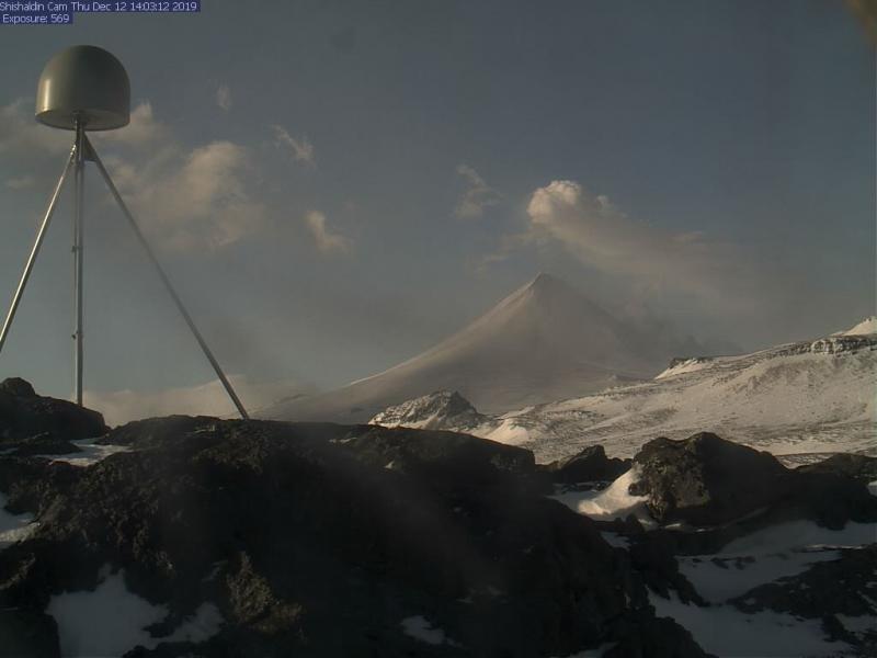 Shishaldin, as seen in AVO&#039;s webcam, Dec 12 2019. Ash visible on flanks from the short-lived explosion earlier this morning (7:10 am AKST). 
