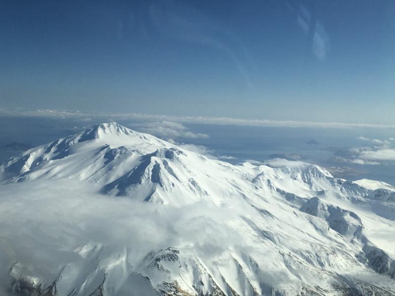 Oblique aerial photo of Great Sitkin taken on March 11, 2020. Take on an Alaska Airlines flight to Adak, Alaska. No signs of surficial changes or activity. 